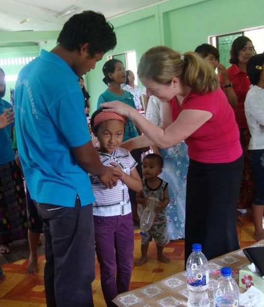 Praying for needs at a Myanmar house church