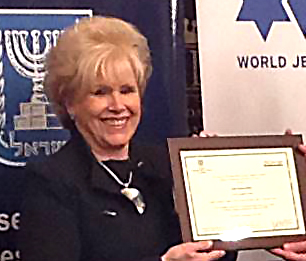 Jane receiving award